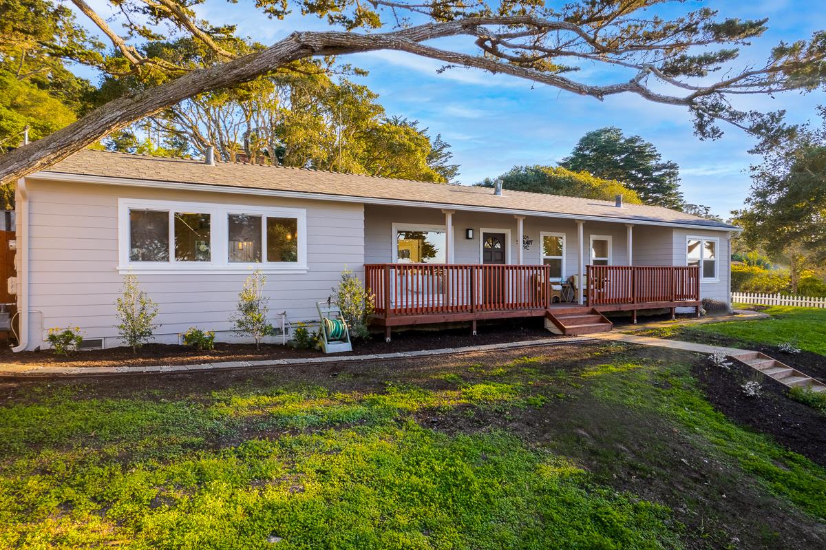 305 Stuart Avenue Pacific Grove, CA 93950 - Photo 4 of 55 a view of a house with a big yard