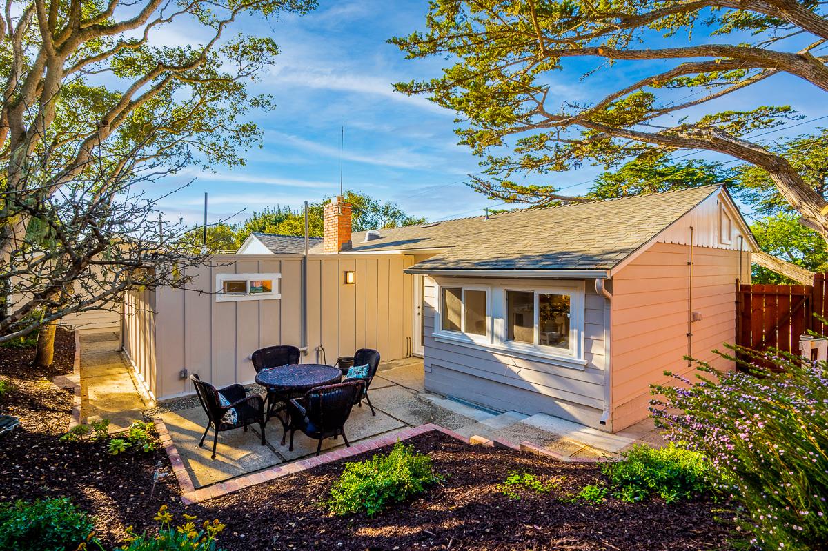 305 Stuart Avenue Pacific Grove, CA 93950 - Photo 48 of 55 a view of a backyard with sitting area