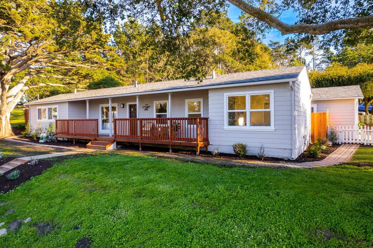 305 Stuart Avenue Pacific Grove, CA 93950 - Photo 5 of 55 a view of a house with a yard and sitting area