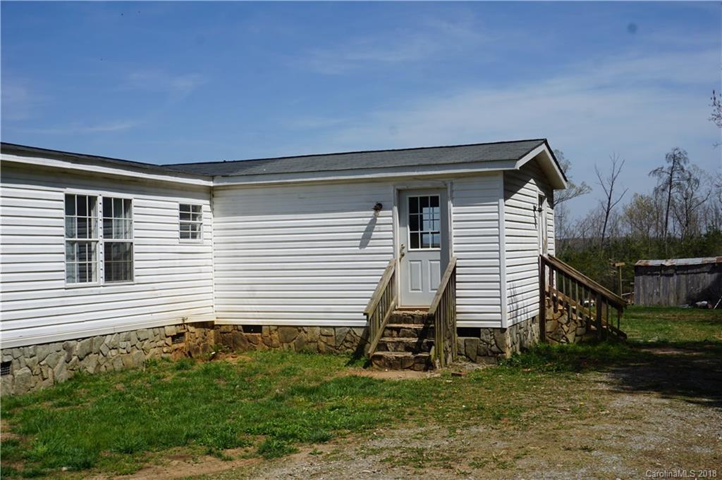 1042 Elliott Road Rutherfordton, NC 28139 - Photo 14 of 33 a view of a house with a yard