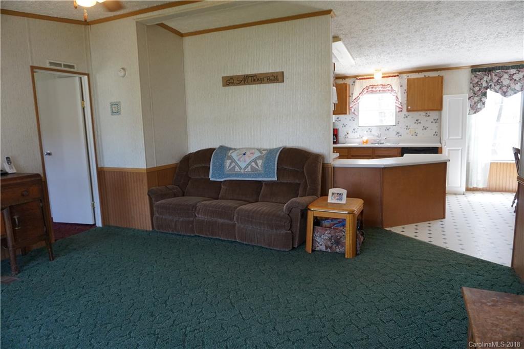 1042 Elliott Road Rutherfordton, NC 28139 - Photo 20 of 33 a living room with furniture and a large window