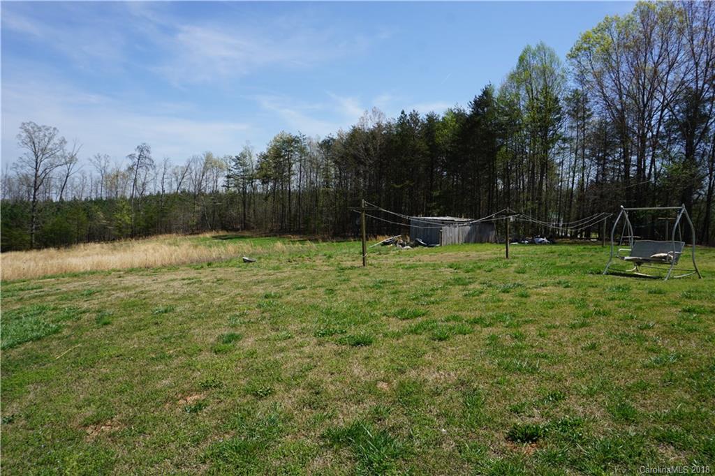 1042 Elliott Road Rutherfordton, NC 28139 - Photo 5 of 33 a view of outdoor space with deck and yard