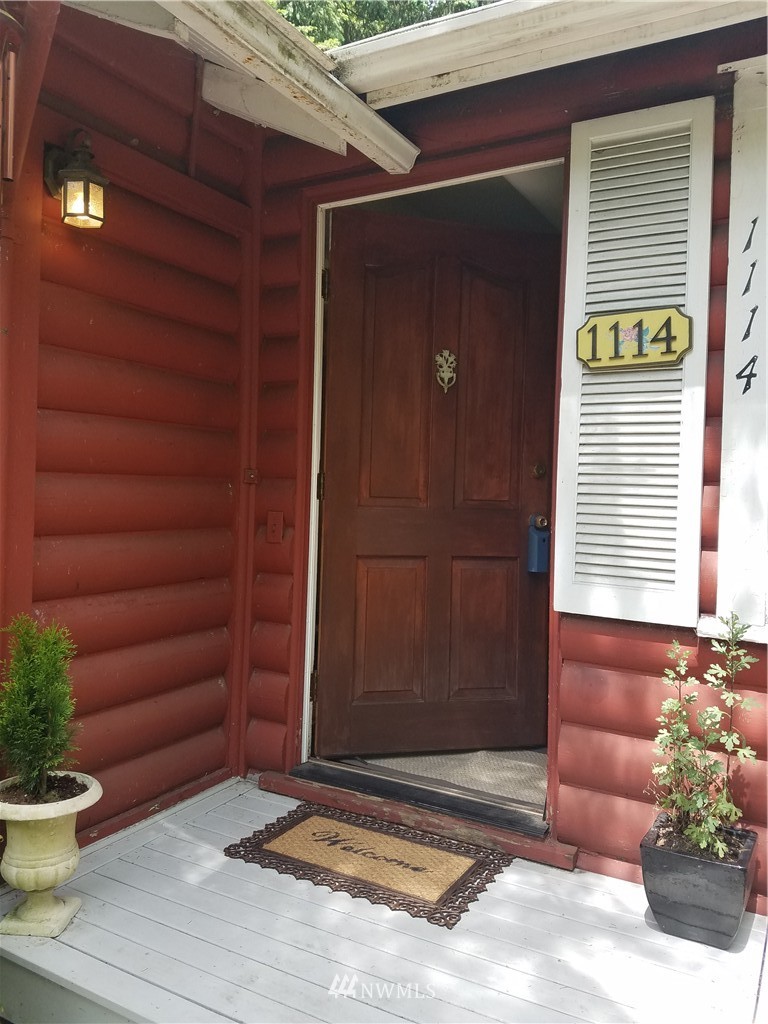 1114 Northeast 145th Street Shoreline, WA 98155 - Photo 2 of 19 a view of entrance gate of the house
