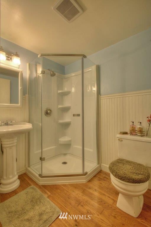 1114 Northeast 145th Street Shoreline, WA 98155 - Photo 15 of 19 a bathroom with a toilet and a shower