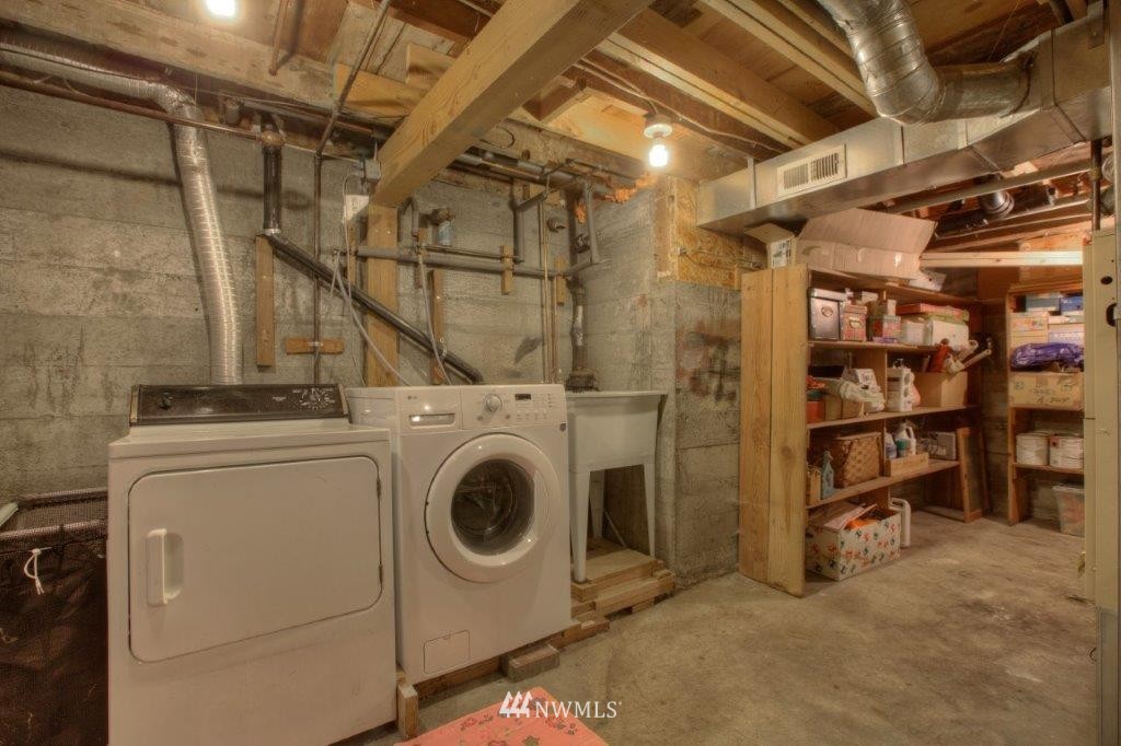 1114 Northeast 145th Street Shoreline, WA 98155 - Photo 16 of 19 a utility room with dryer and washer