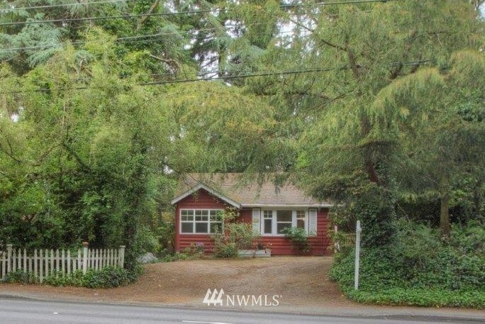 1114 Northeast 145th Street Shoreline, WA 98155 - Photo 19 of 19 front view of a house with a street