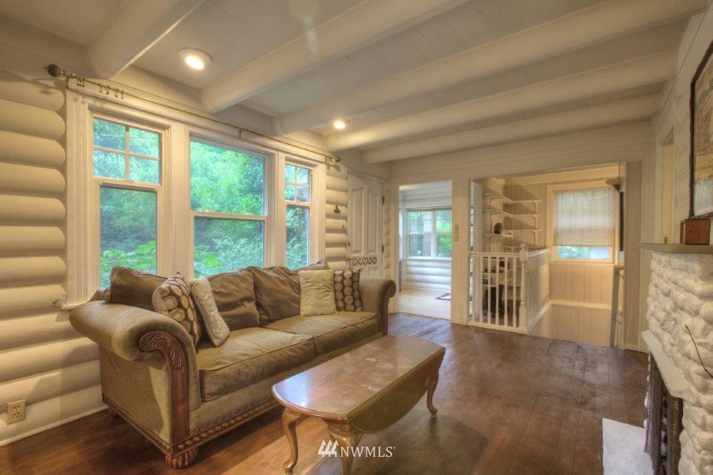 1114 Northeast 145th Street Shoreline, WA 98155 - Photo 5 of 19 a living room with furniture and a large window