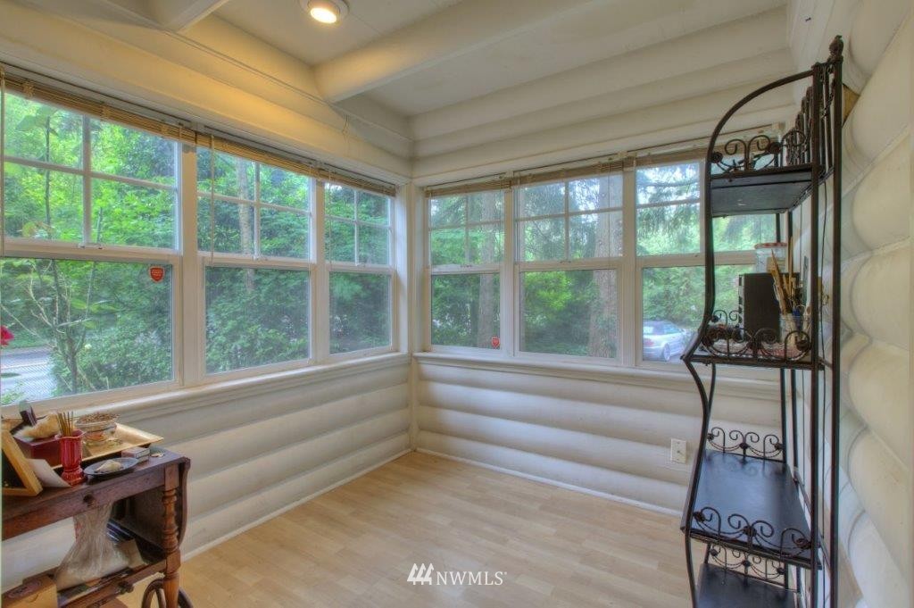 1114 Northeast 145th Street Shoreline, WA 98155 - Photo 6 of 19 a living room with hardwood floor and large windows