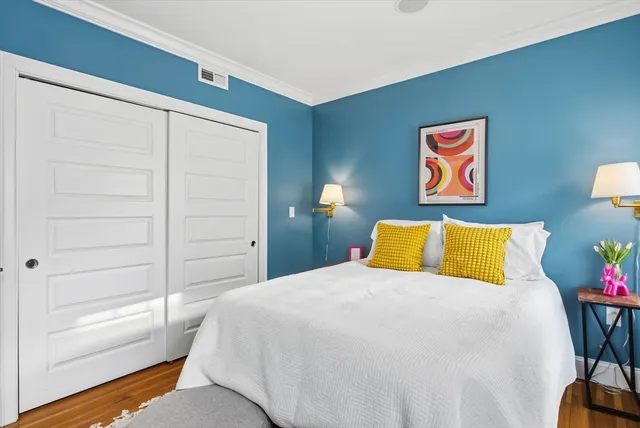 a view of a room with chairs and a table