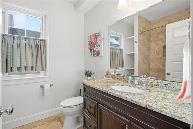 a view of a room with wooden floor and closet