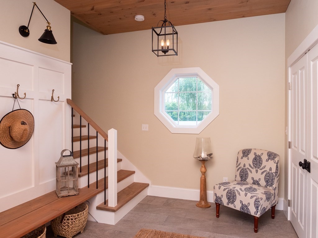 740 Reed Road Dartmouth, MA 02747 - Photo 16 of 26 a view of entryway livingroom and hall with wooden floor