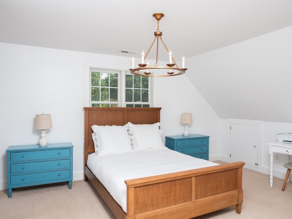 740 Reed Road Dartmouth, MA 02747 - Photo 22 of 26 a bedroom with a bed and a window