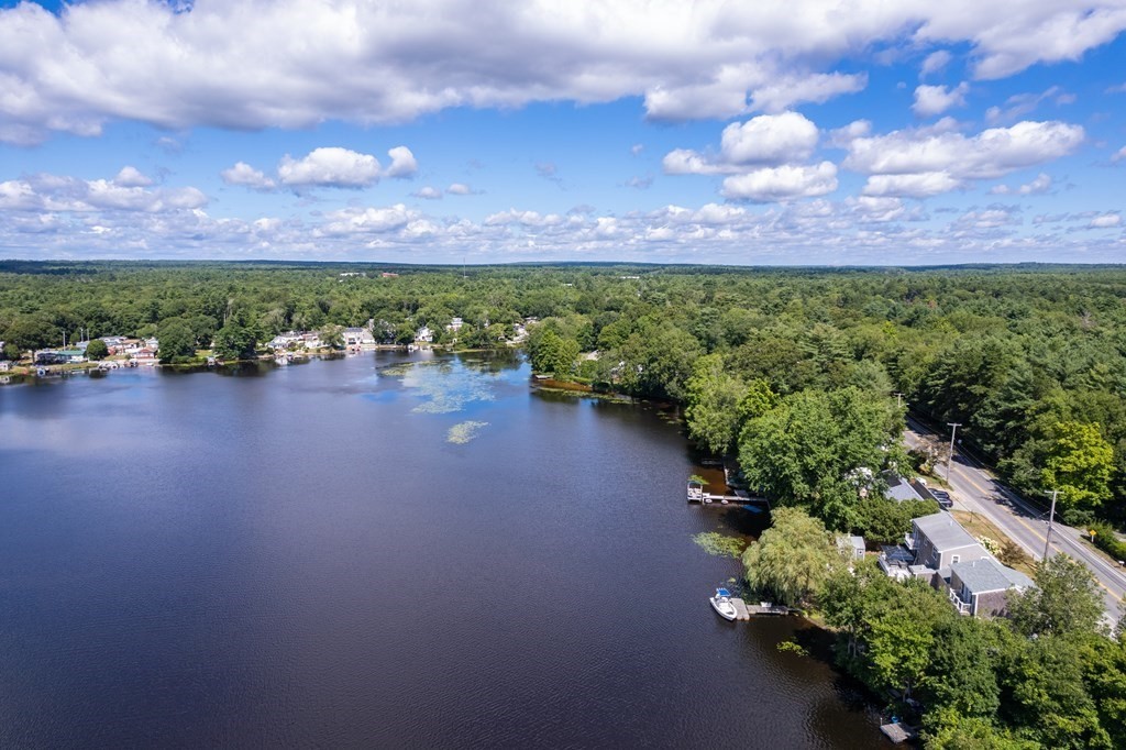 740 Reed Road Dartmouth, MA 02747 - Photo 25 of 26 a view of a lake with a city in the back