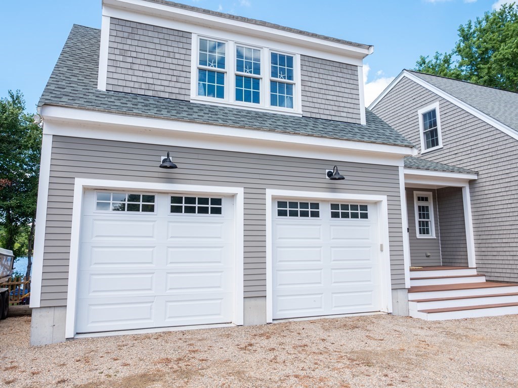 740 Reed Road Dartmouth, MA 02747 - Photo 5 of 26 a view of a house with a backyard