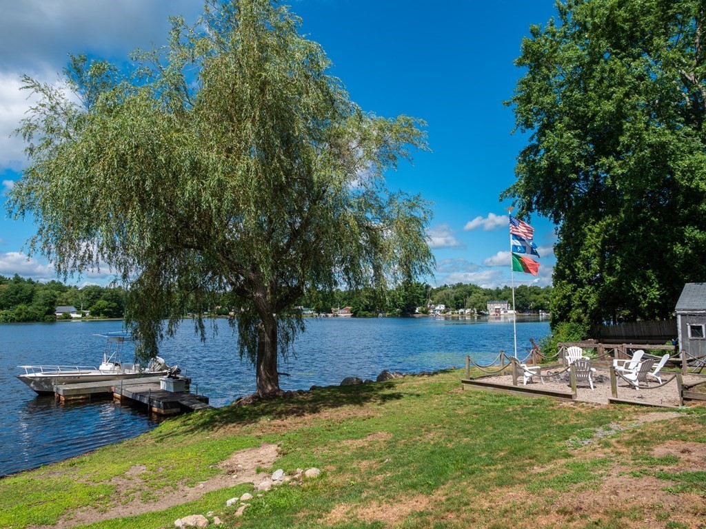 740 Reed Road Dartmouth, MA 02747 - Photo 6 of 26 a view of a backyard with swimming pool