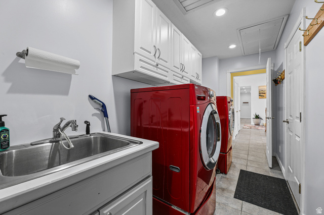 4117 North Wolf Ridge Circle Eden, UT 84310 - Photo 26 of 63 Dedicated laundry area featuring a utility sink, white cabinetry with silver hardware, and tiled flooring