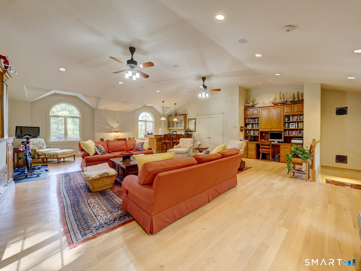 13 Executive Hill Road Wolcott, CT 06716 - Photo 18 of 40 a living room with furniture kitchen view and a chandelier