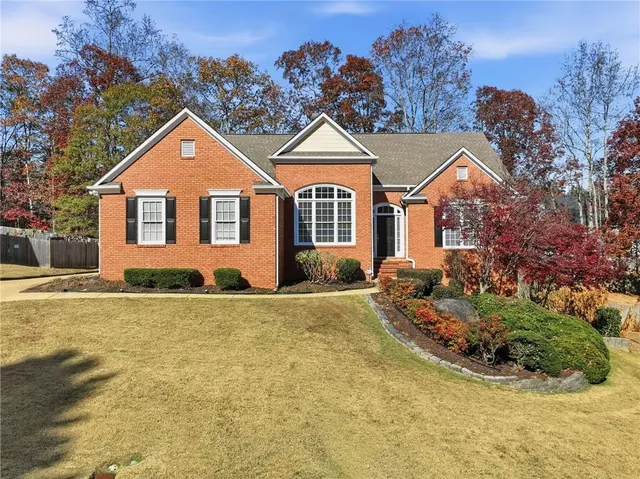 front view of a house with a yard