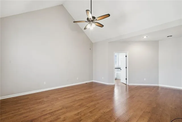 a bathroom with double sink and a mirror
