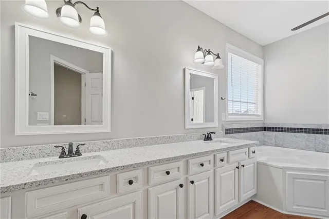 a view of hallway with wooden floor