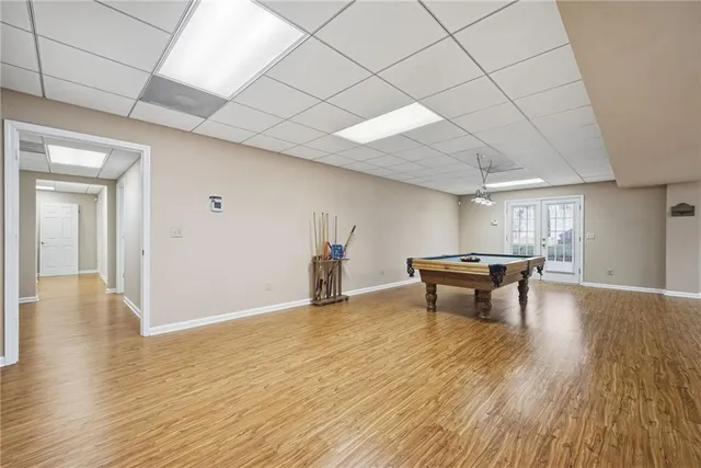 a view of garage with a patio