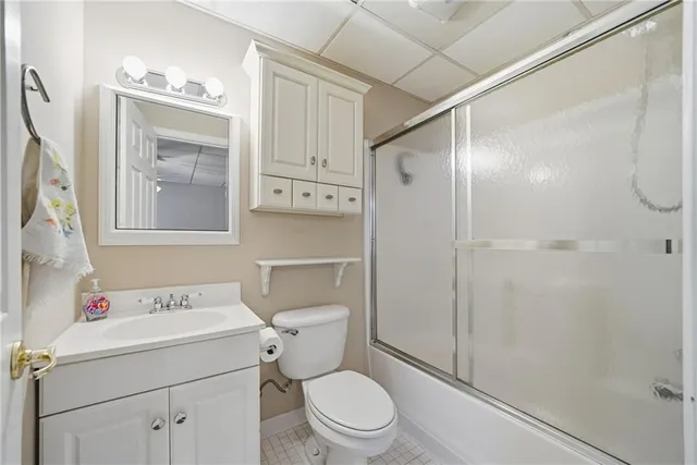 a view of a backyard with plants and a garden