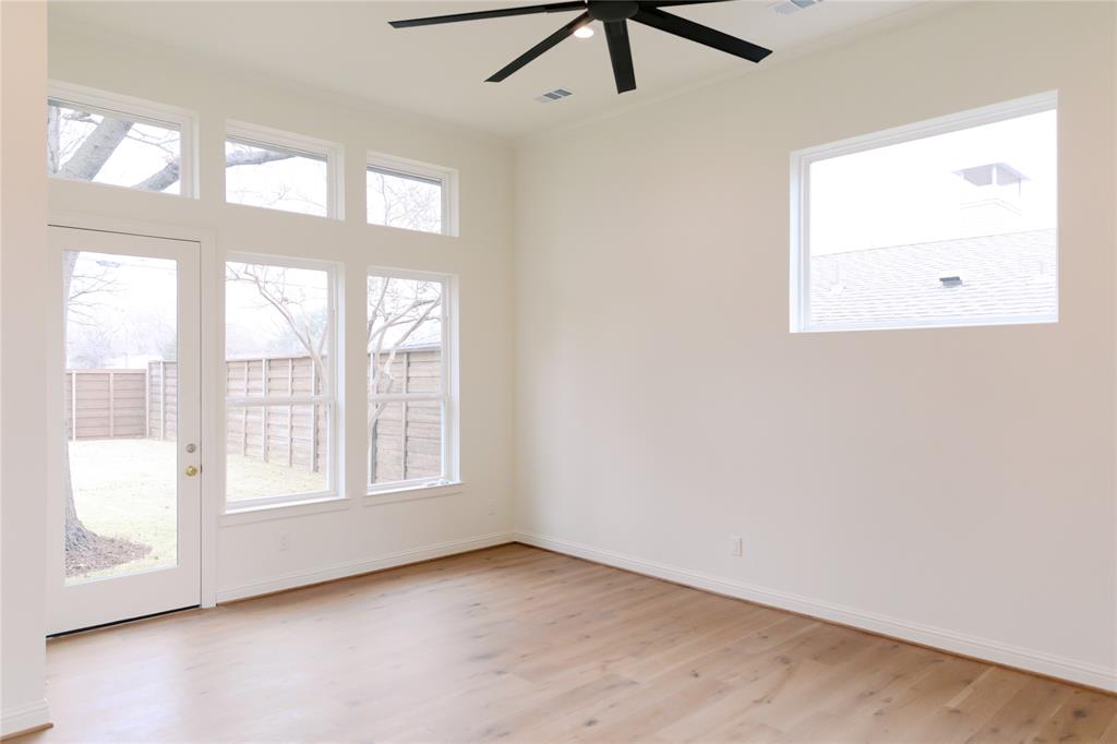 10930 Beauty Lane Dallas, TX 75229 - Photo 19 of 27 an empty room with a window