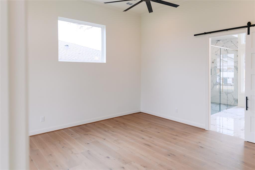 10930 Beauty Lane Dallas, TX 75229 - Photo 20 of 27 an empty room with a window