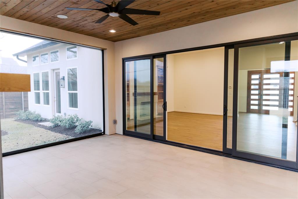 10930 Beauty Lane Dallas, TX 75229 - Photo 25 of 27 a view of an empty room with a window