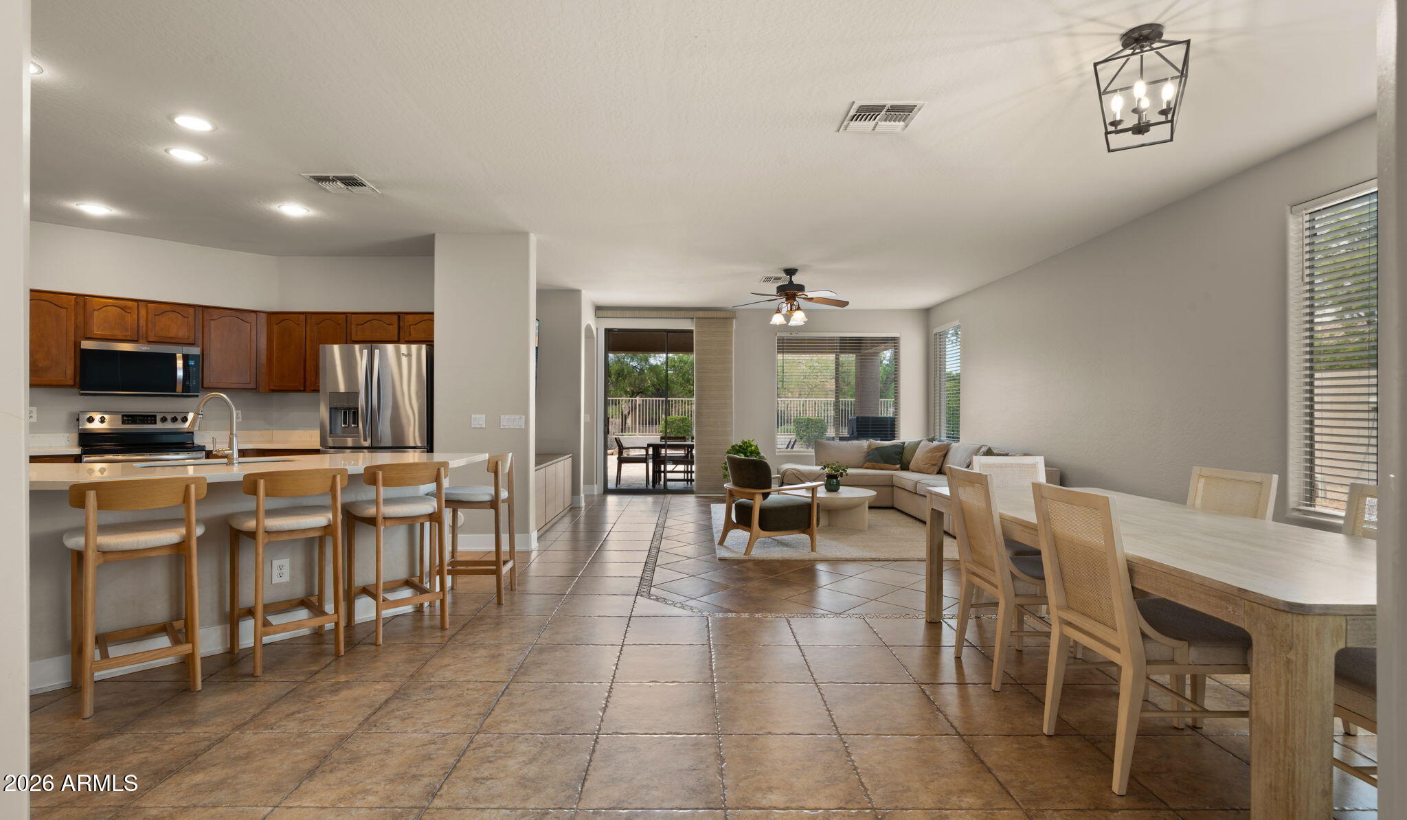 3344 East Hopkins Road Gilbert, AZ 85295 - Photo 5 of 32 a view of a dining area with furniture