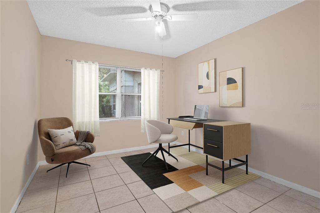 10 Kepner Street Orlando, FL 32839 - Photo 19 of 26 a work room with furniture and windows