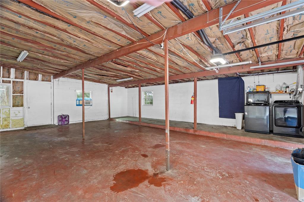 10 Kepner Street Orlando, FL 32839 - Photo 22 of 26 a view of empty room with wooden ceiling