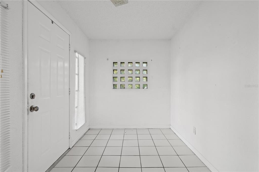 10 Kepner Street Orlando, FL 32839 - Photo 4 of 26 a view of an empty room and window