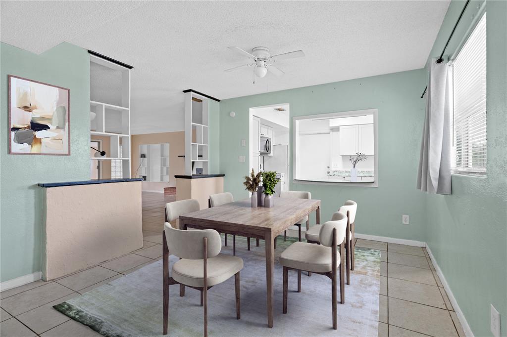 10 Kepner Street Orlando, FL 32839 - Photo 5 of 26 a dining room with furniture and window