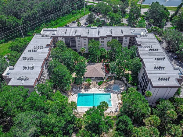 an aerial view of a house with a garden