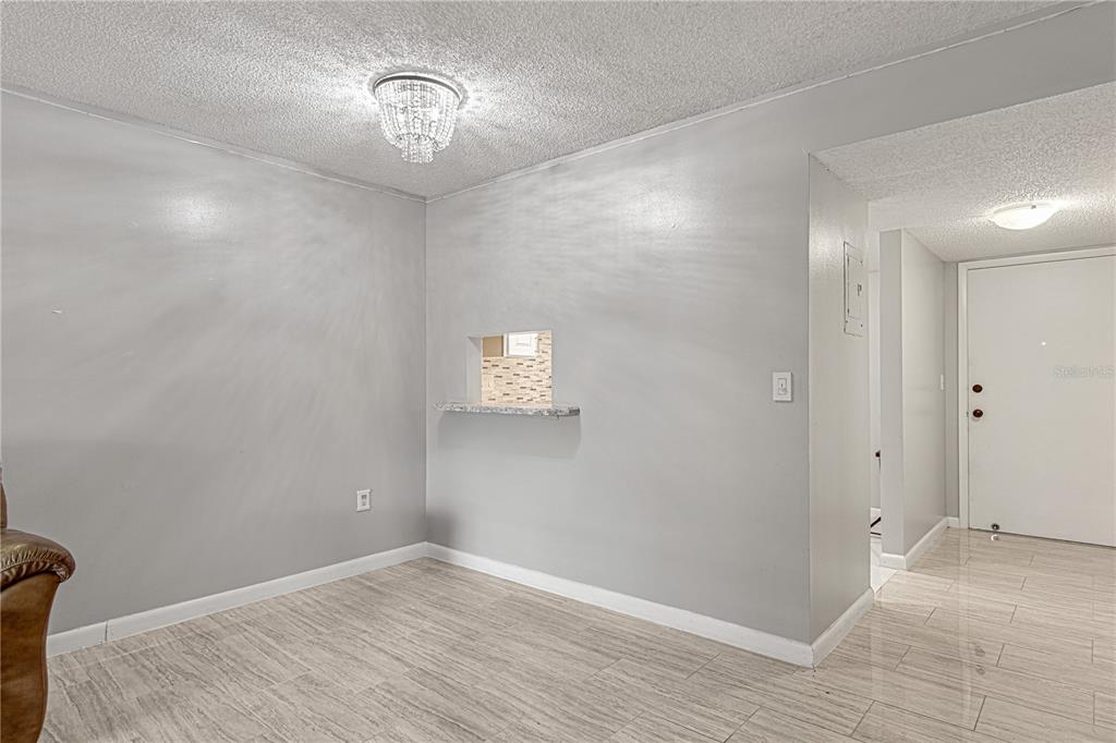 640 North Nova Road, Unit 409 Ormond Beach, FL 32174 - Photo 10 of 33 a view of an empty room with a window