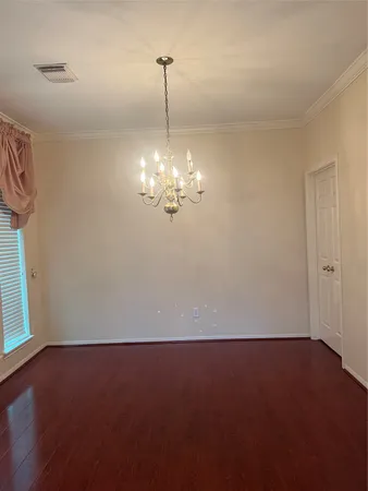 a view of empty room with a window