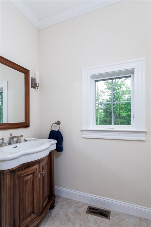 150 Packard Hill Road Ashburnham, MA 01430 - Photo 18 of 31 a bathroom with a sink and a mirror