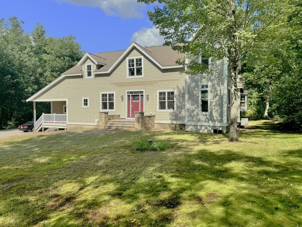 150 Packard Hill Road Ashburnham, MA 01430 - Photo 2 of 31 a front view of house with yard