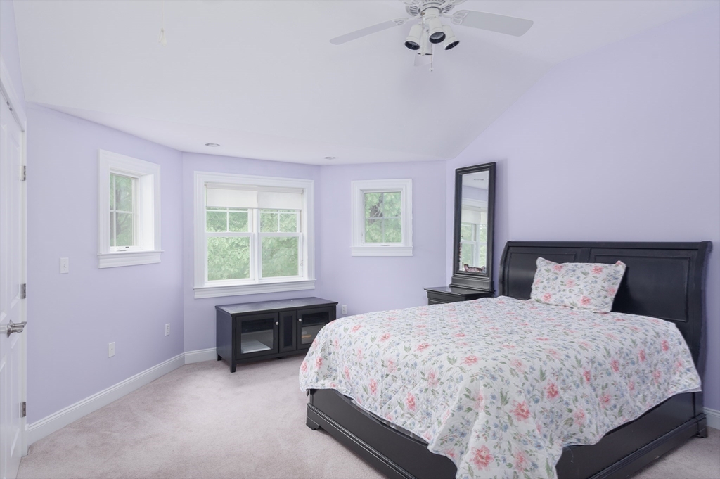 150 Packard Hill Road Ashburnham, MA 01430 - Photo 21 of 31 a bedroom with a bed and a table