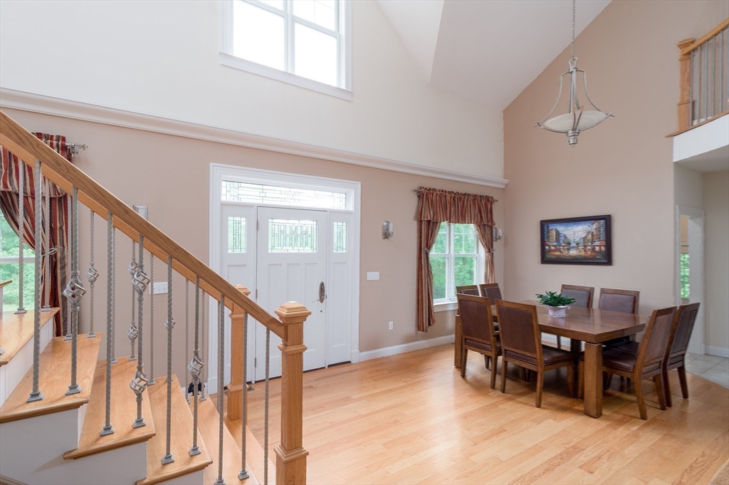 150 Packard Hill Road Ashburnham, MA 01430 - Photo 10 of 31 a view of a dining room with furniture window and wooden floor