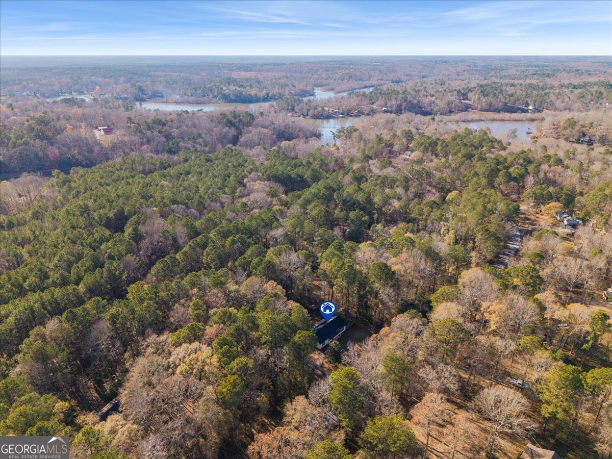 93 Robin Hood Road Covington, GA 30014 - Photo 18 of 20 an aerial view of house with yard and mountain view in back