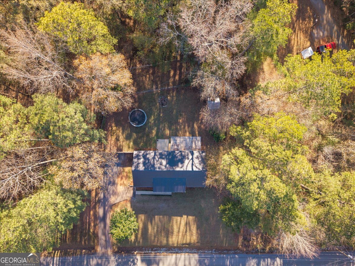93 Robin Hood Road Covington, GA 30014 - Photo 19 of 20 a view of fountain in middle of the garden