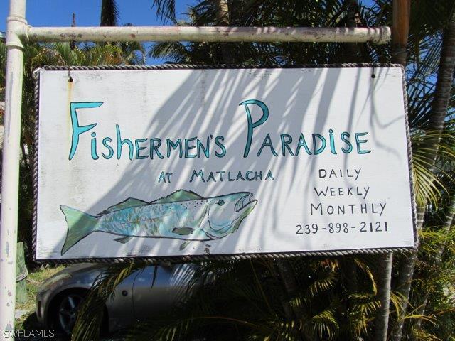 2606 Second Street Cape Coral, FL 33993 - Photo 3 of 24 a black and white photo of a book