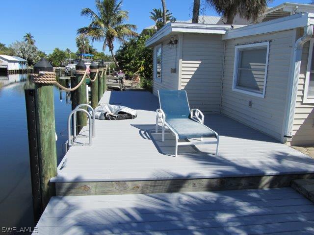 2606 Second Street Cape Coral, FL 33993 - Photo 5 of 24 a view of a dinning table and chairs in patio