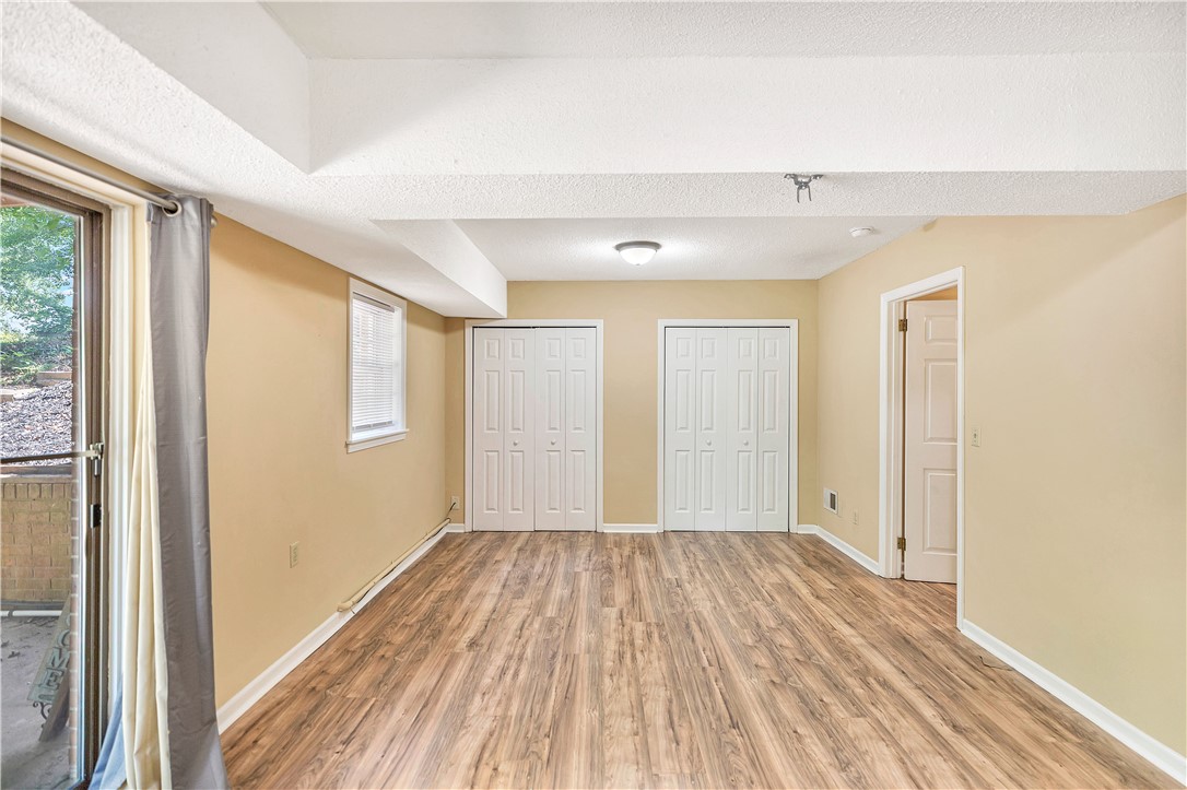 2011 Forest Drive Seneca, SC 29672 - Photo 35 of 36 A versatile room featuring durable wood-look flooring and ample closet storage.