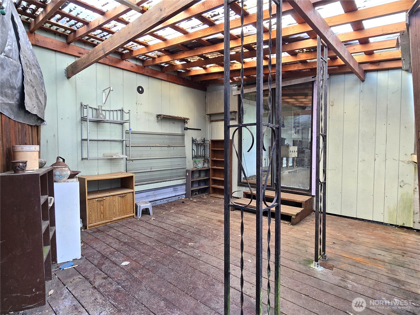 520 North 3rd Street Elma, WA 98541 - Photo 25 of 28 a view of an empty room with wooden floor and windows