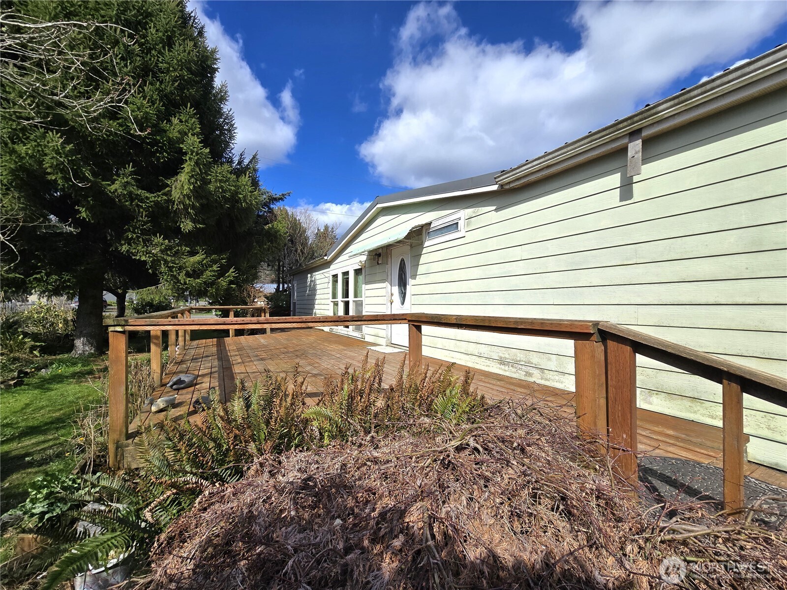 520 North 3rd Street Elma, WA 98541 - Photo 26 of 28 a view of swimming pool with a yard
