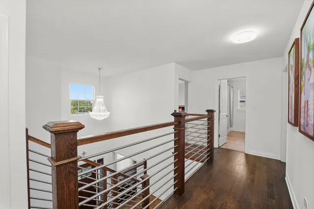 a view of entryway with wooden floor