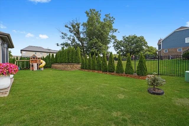 a view of a backyard with a garden